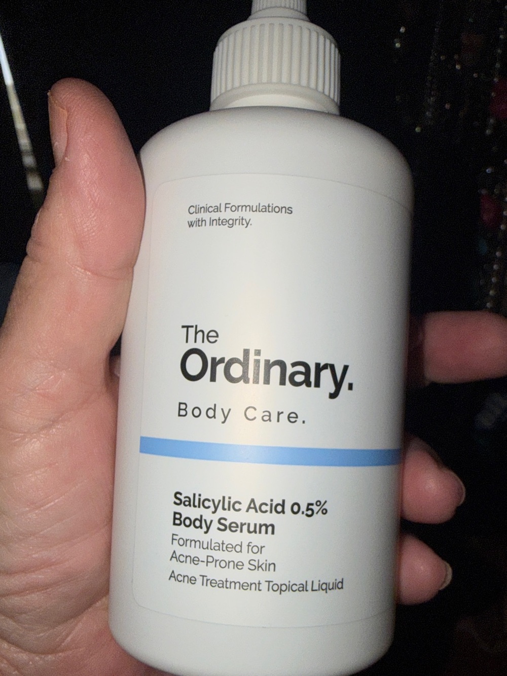 The Ordinary White Acne Treatment Bottle with Blue Accent